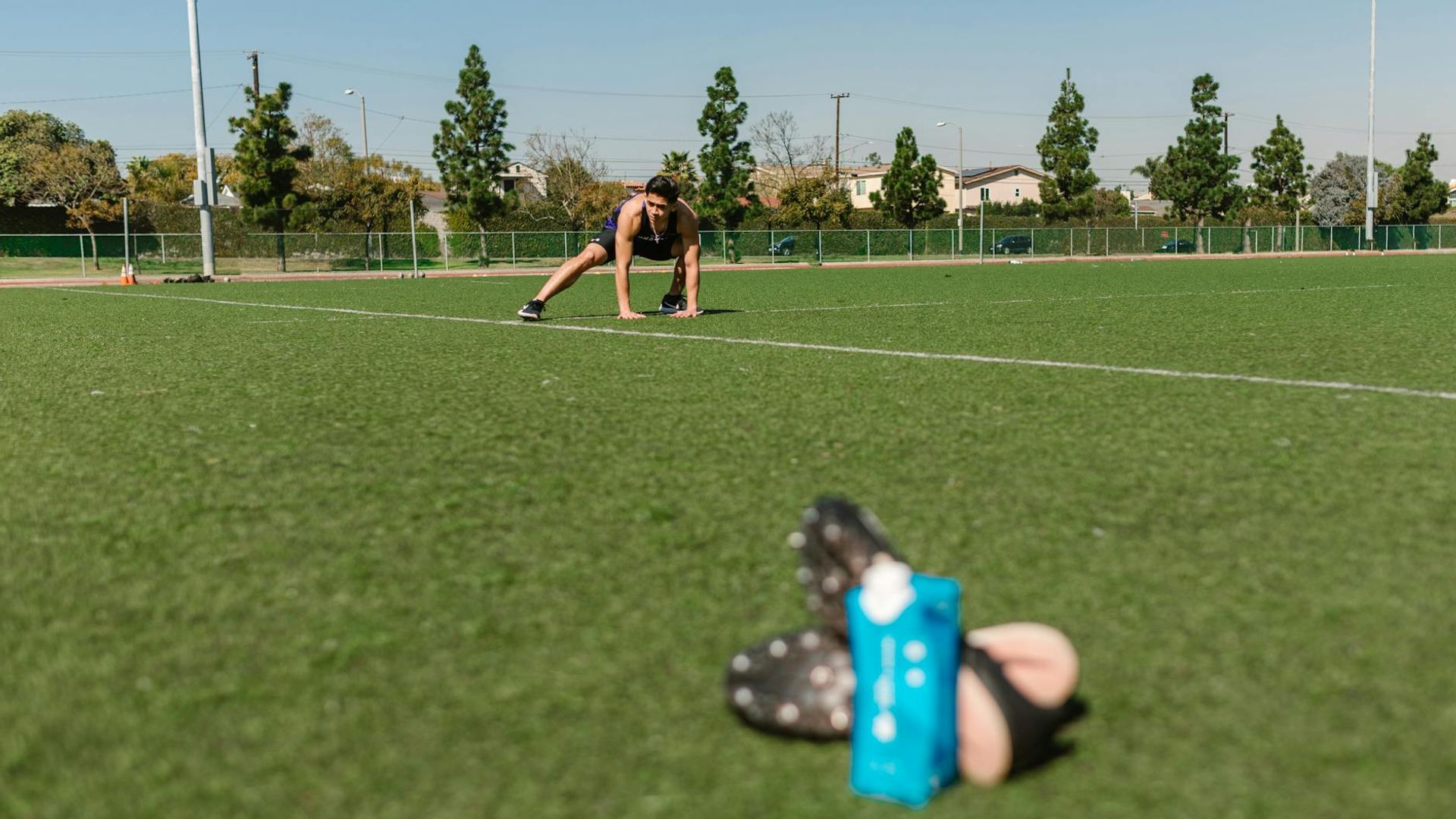 Man in a calm, focused state preparing for a workout.